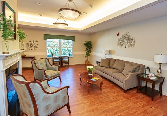 Comfortable living room space with seating and natural light