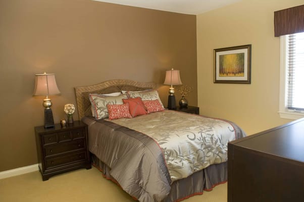 Warm and inviting bedroom with a bed and nightstands