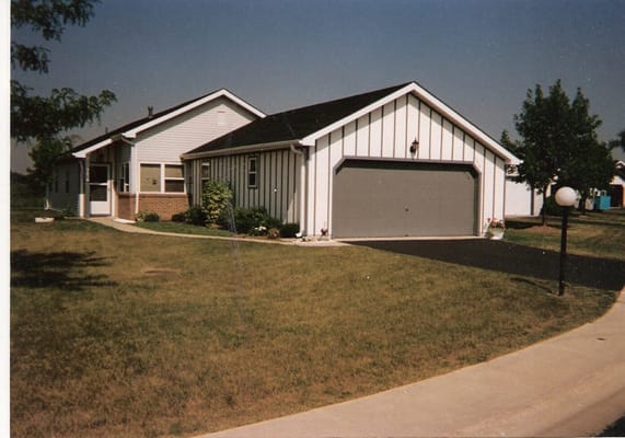Exterior view of a house at Village Green Active Senior Living.