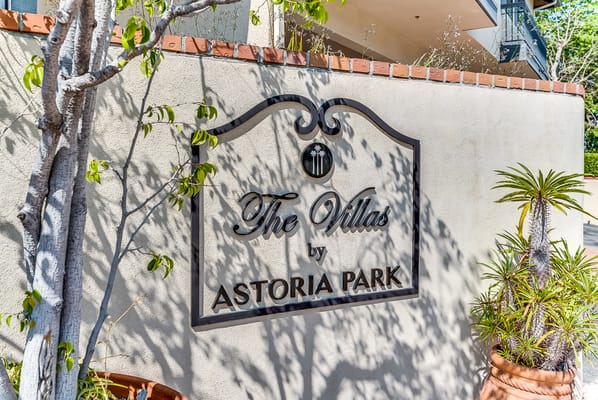 Exterior sign of The Villas by Astoria Park