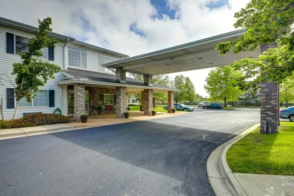 The entrance of Waneka Park Assisted Living facility with a covered area