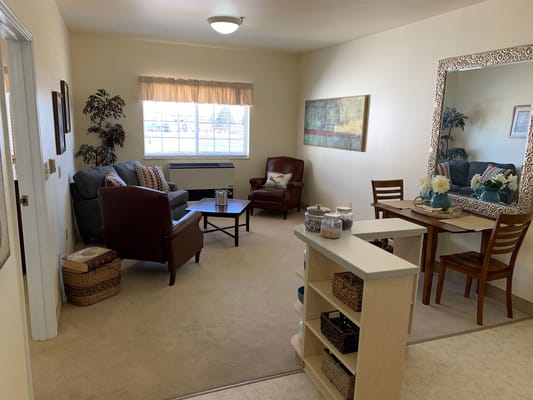 Cozy interior of a resident's room with seating area
