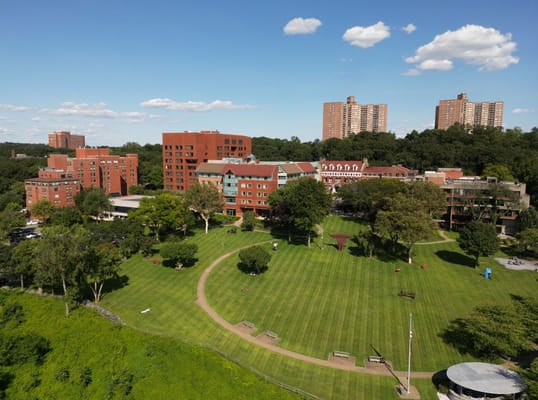 Aerial view of RiverSpring Living's landscaped grounds and buildings