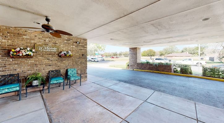 Entrance of Wisteria Place with welcome sign