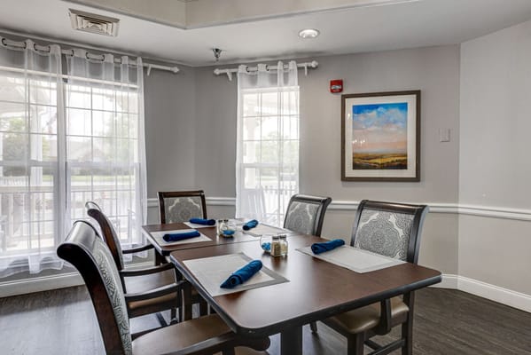 Dining area set for mealtime with decor