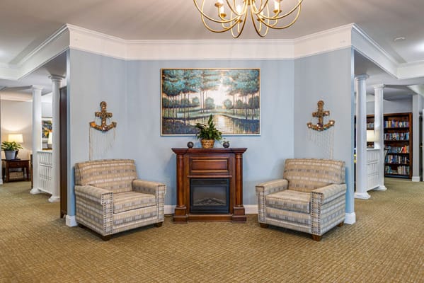Common area with seating and decorative artwork