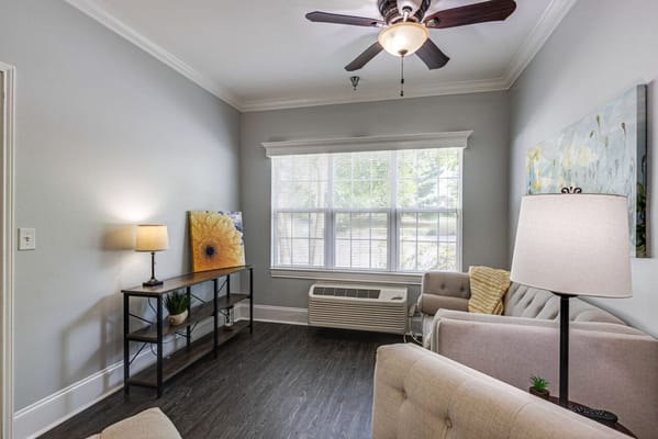 Bright common area with comfortable seating and natural light