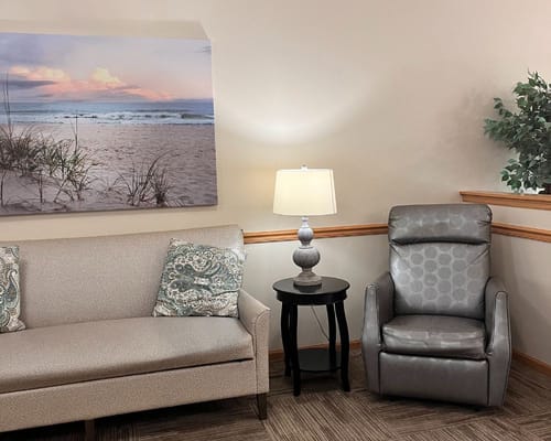 Cozy common area with a beach-themed wall art