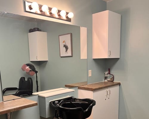 Hair salon station in a facility