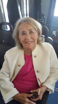 Smiling senior woman sitting indoors