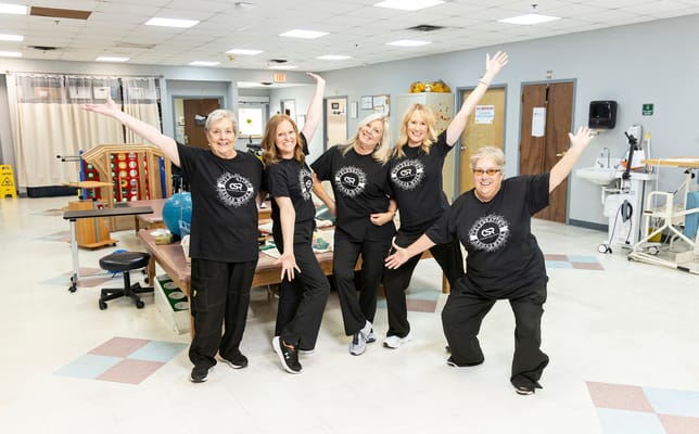 Staff members celebrating in a common area