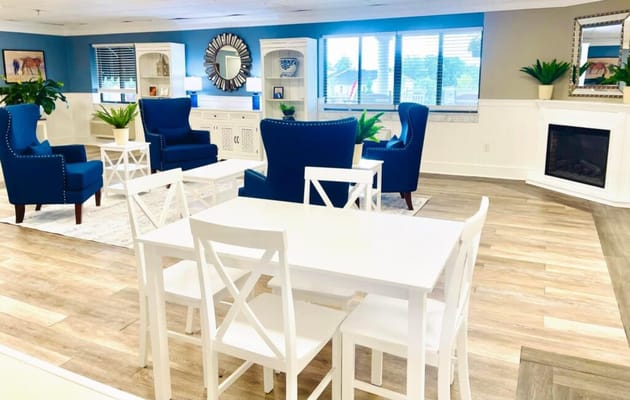 Bright common area with seating and decor