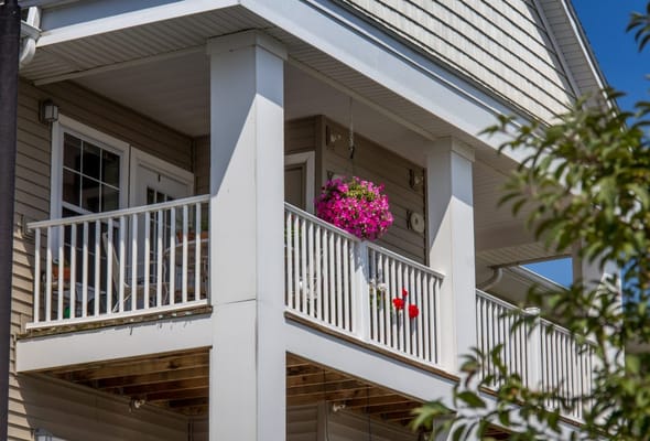 Balcony with hanging flower pots