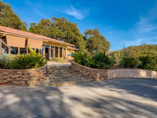 Entrance to Hidden Meadows with landscaped area