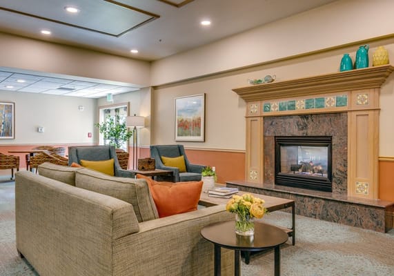 Interior common area with seating and fireplace