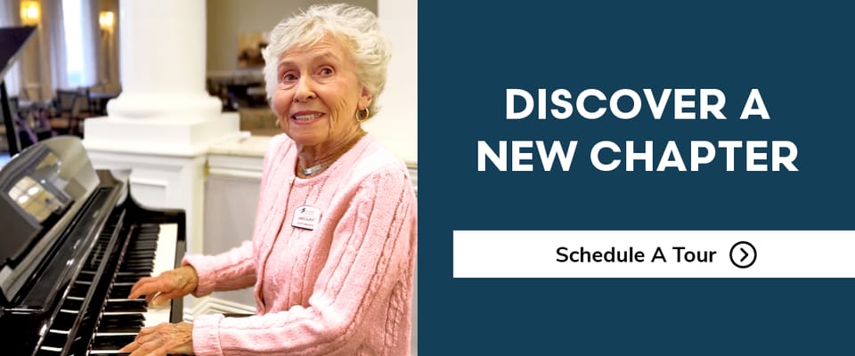 Senior resident playing piano in a welcoming common area