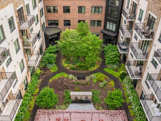 Aerial view of a landscaped courtyard with greenery