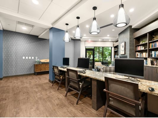 Modern computer station in a bright common area