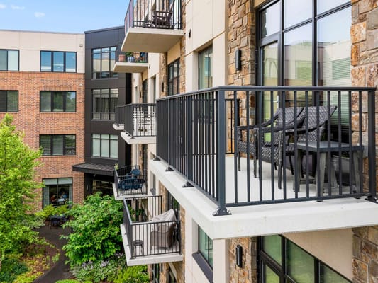 Balconies overlooking a landscaped courtyard at Eagleview Landing