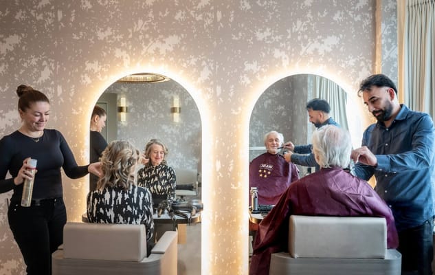 Residents getting hairstyles in a modern salon
