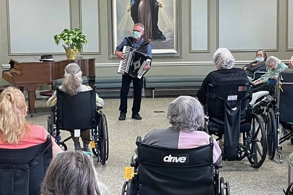 Resident activity with accordion music performance