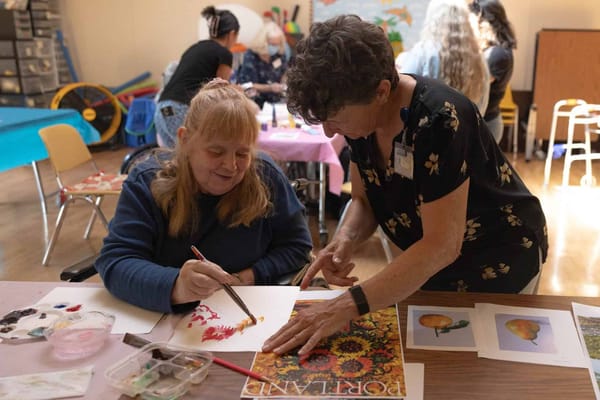 Residents engaging in an art activity