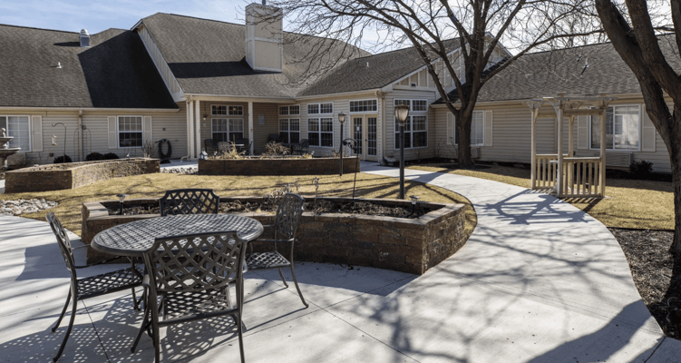 Outdoor seating area with tables and pathways