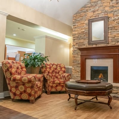 Cozy seating area with a fireplace in the lounge
