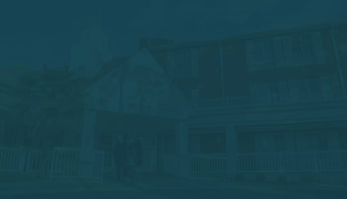 Residents entering the facility on a sunny day