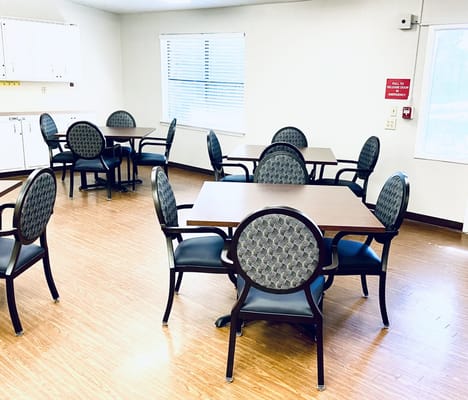 Dining area with multiple tables and chairs