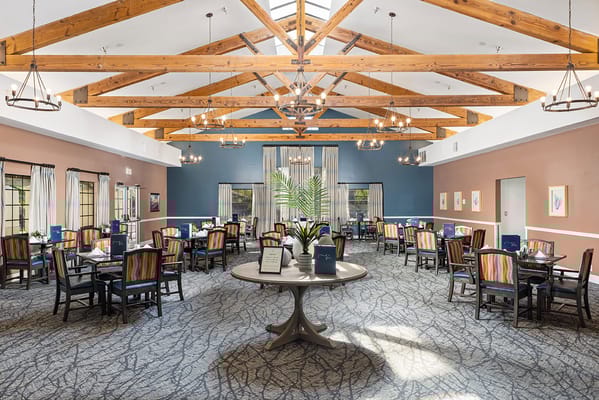 Dining area with communal tables and modern decor
