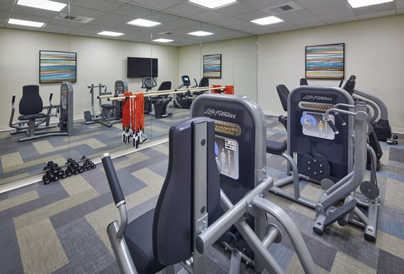 Interior view of a fitness room with exercise equipment
