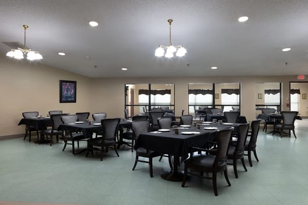 Dining room with tables set for meals