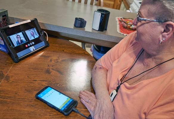 Resident engaging in a video call at a shared space