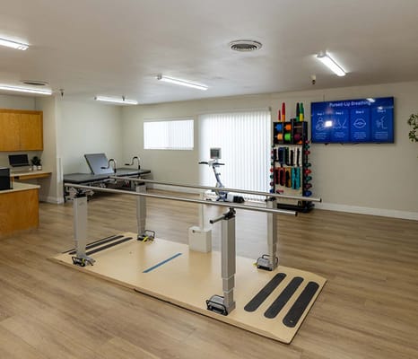 Rehabilitation gym with therapy equipment and exercises