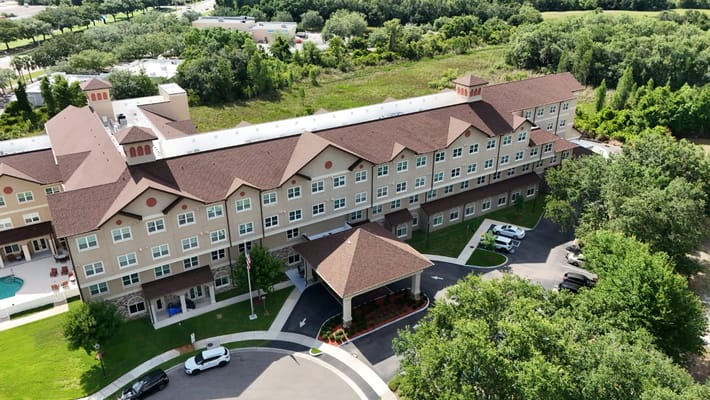 Aerial view of Discovery Village At Tampa Palms showcasing the building and entrance.