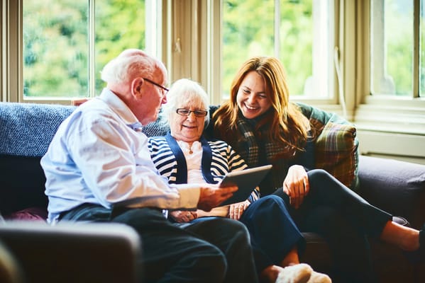 Residents and staff enjoying time together in a common area