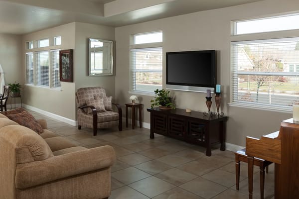 Bright common area with seating and natural light