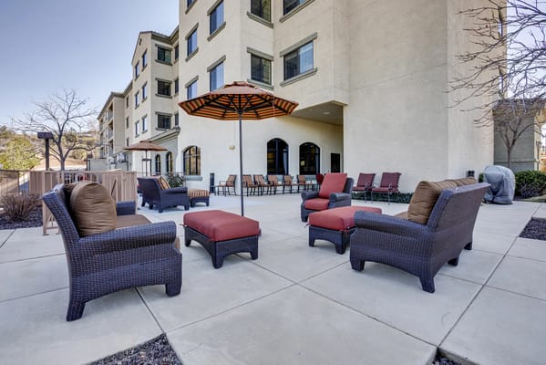 Outdoor seating area with umbrellas at the facility