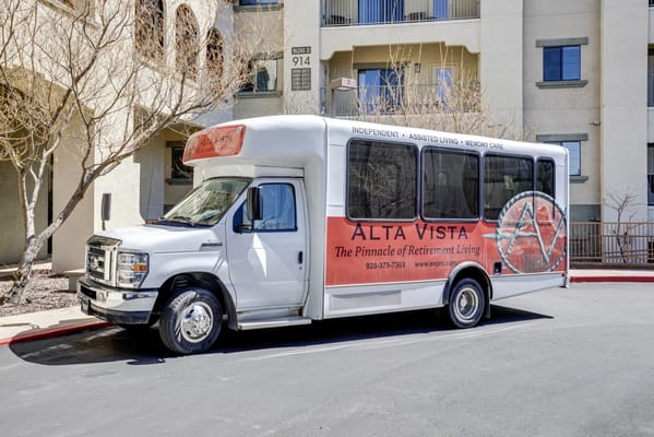 Facility transport van parked outside the building