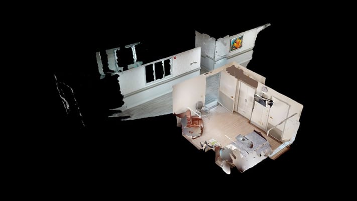 Interior view of a room at Southview Acres with a chair and table.