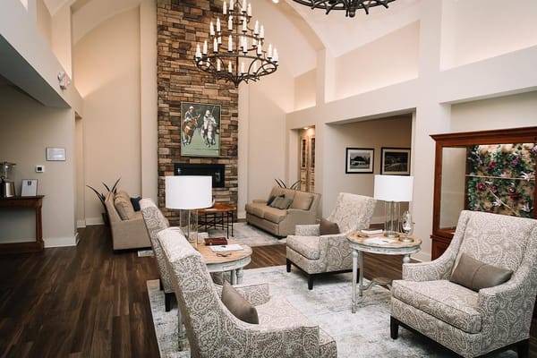 Bright common area with seating and artwork