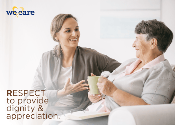 Caregiver and resident enjoying a conversation.