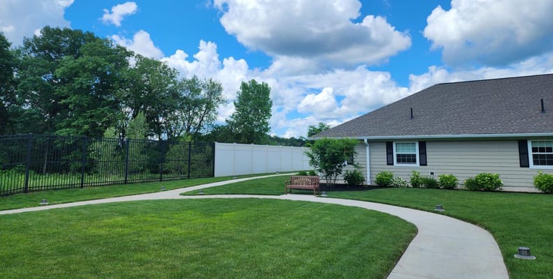 Beautiful outdoor space with a walkway and seating area