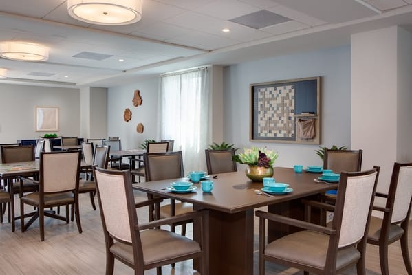 Dining area with well-set tables and decor