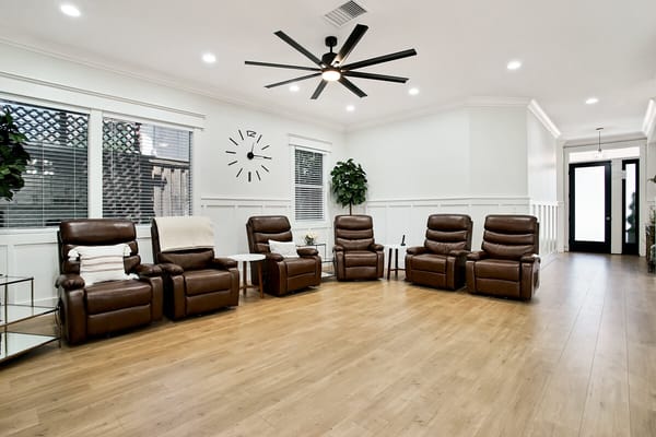 Interior common area with reclining chairs