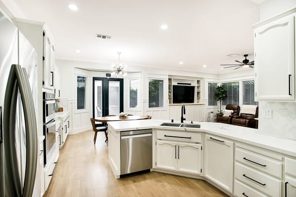 Bright interior view of a modern kitchen and dining area