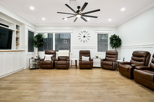 Cozy common area with recliners and modern decor
