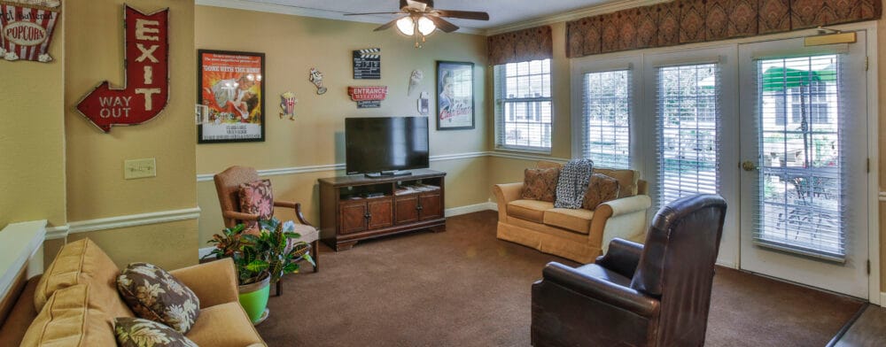 Cozy common area with seating and a television