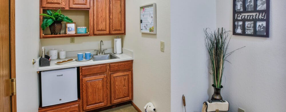 Cozy kitchenette area in a resident's suite